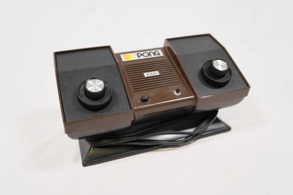 Atari Home Pong C-100 console with built-in paddle knobs